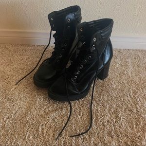 Black heeled lace up booties